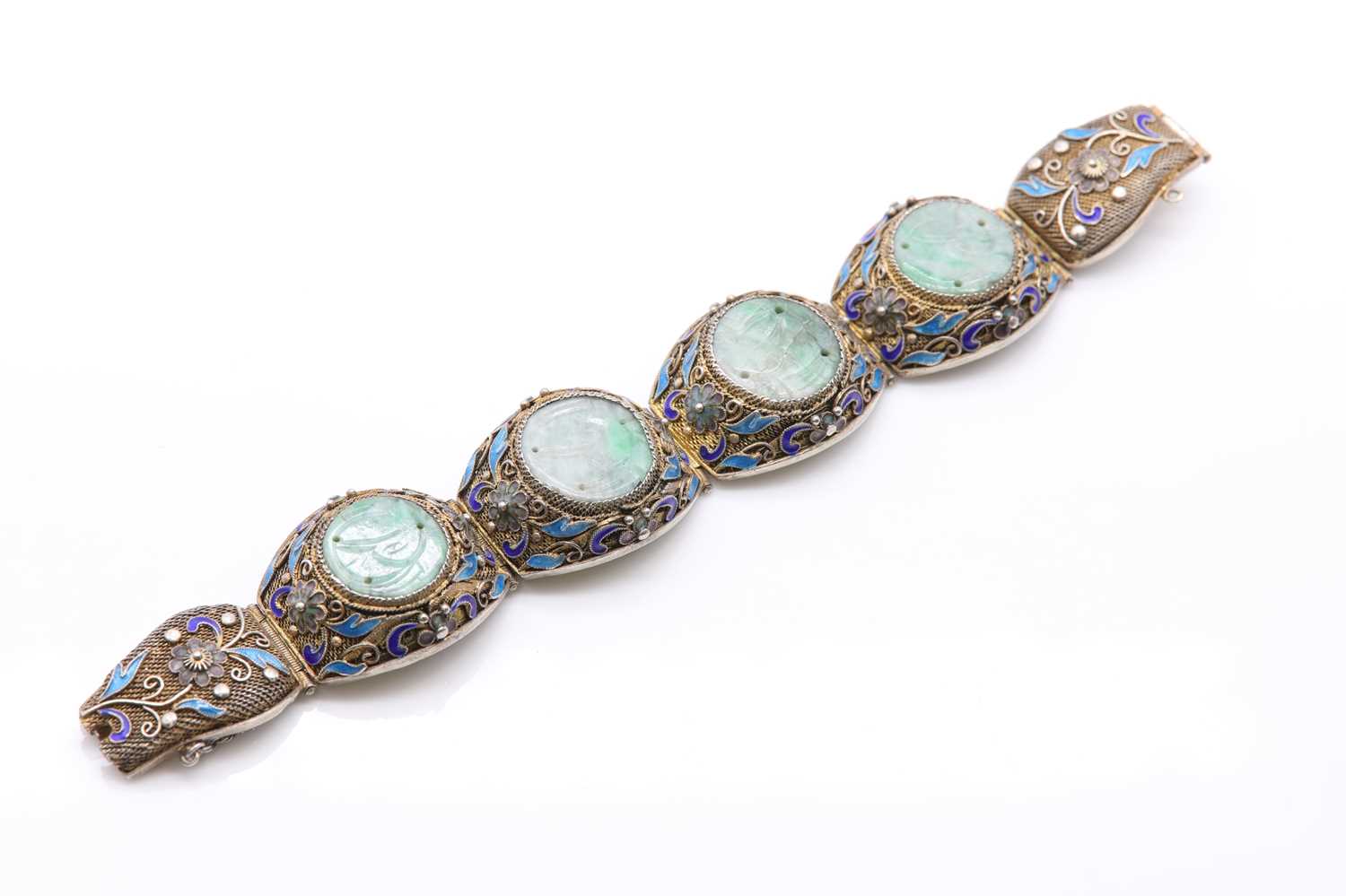 Lot 130 - A Chinese silver gilt filigree, jade and enamel bracelet.