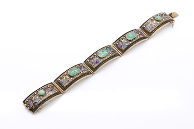 Lot 131 - A Chinese silver gilt filigree, jade and enamel bracelet