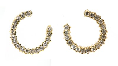 Lot 395 - A pair of diamond set hoop style earrings