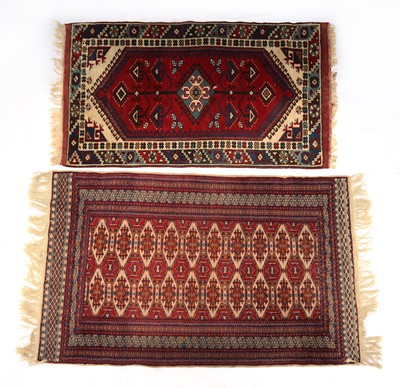Lot 297 - A tribal rug
