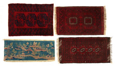 Lot 373 - A group of three small Bokhara rugs