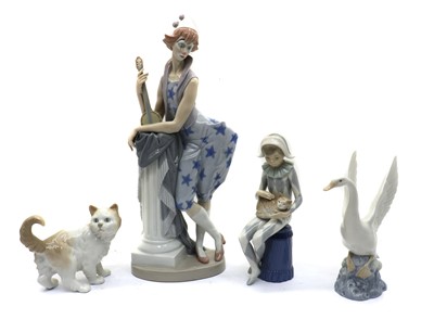 Lot 175 - A collection of four Nao porcelain figurines