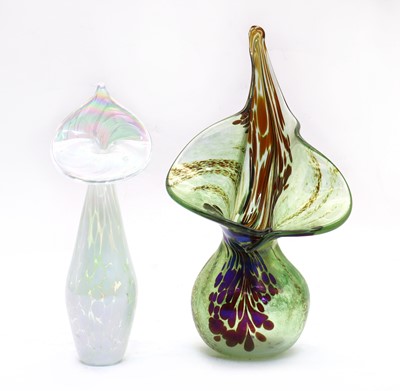 Lot 214 - An iridescent glass jack in the pulpit vase