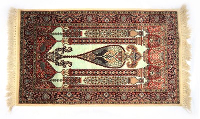 Lot 379 - A part silk Kirman rug