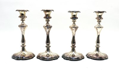 Lot 45 - A set of four Victorian style silver plated candlesticks
