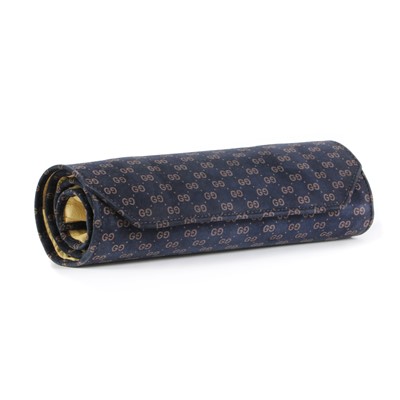 Lot 1479 - A Vintage Gucci blue suede jewellery roll