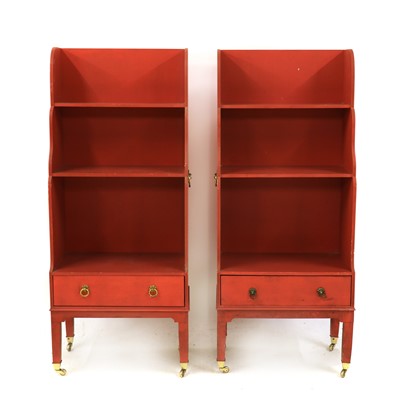 Lot 345 - A pair of Sheraton style red-painted waterfall bookcases