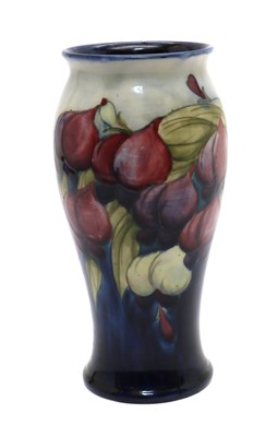 Lot 145 - A William Moorcroft 'Wisteria' pattern pottery vase