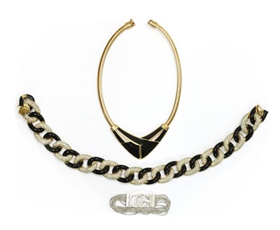Lot 457 - A gold plated Christian Dior paste set and black enamel curb link necklace