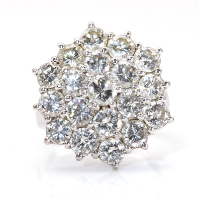 Lot 167 - A diamond set hexagonal cluster ring