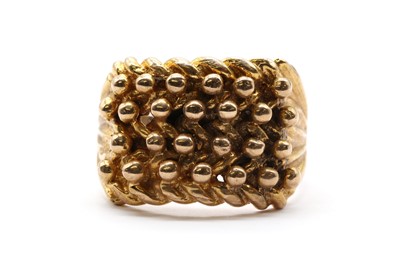 Lot 300 - A 9ct gold keeper ring