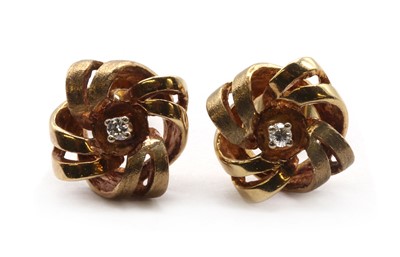 Lot 118 - A pair of 9ct gold diamond set knot earrings