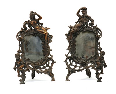 Lot 254 - A pair of silver plated Art Nouveau easel back mirrors