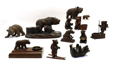 Lot 266 - A collection of black forest wood carvings