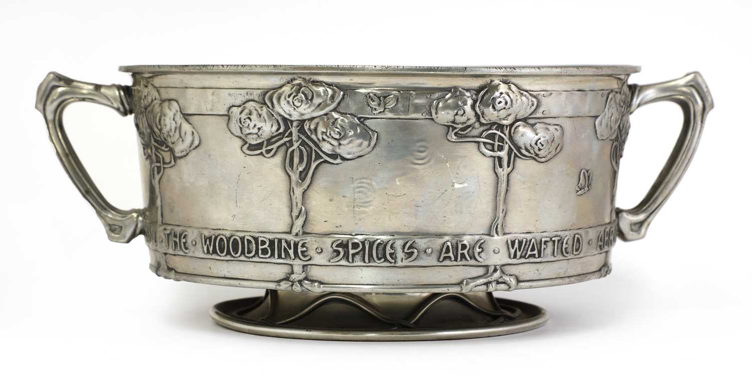 Lot 44 - An Arts and Crafts twin-handled Tudric pewter rose bowl