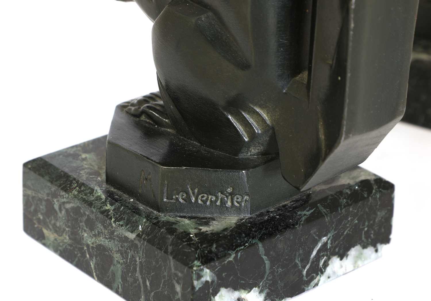 Lot 90 A pair of art metal squirrel bookends,