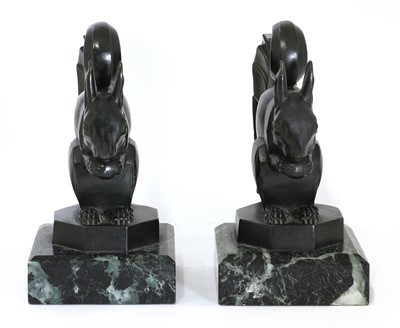 Lot 90 - A pair of art metal squirrel bookends