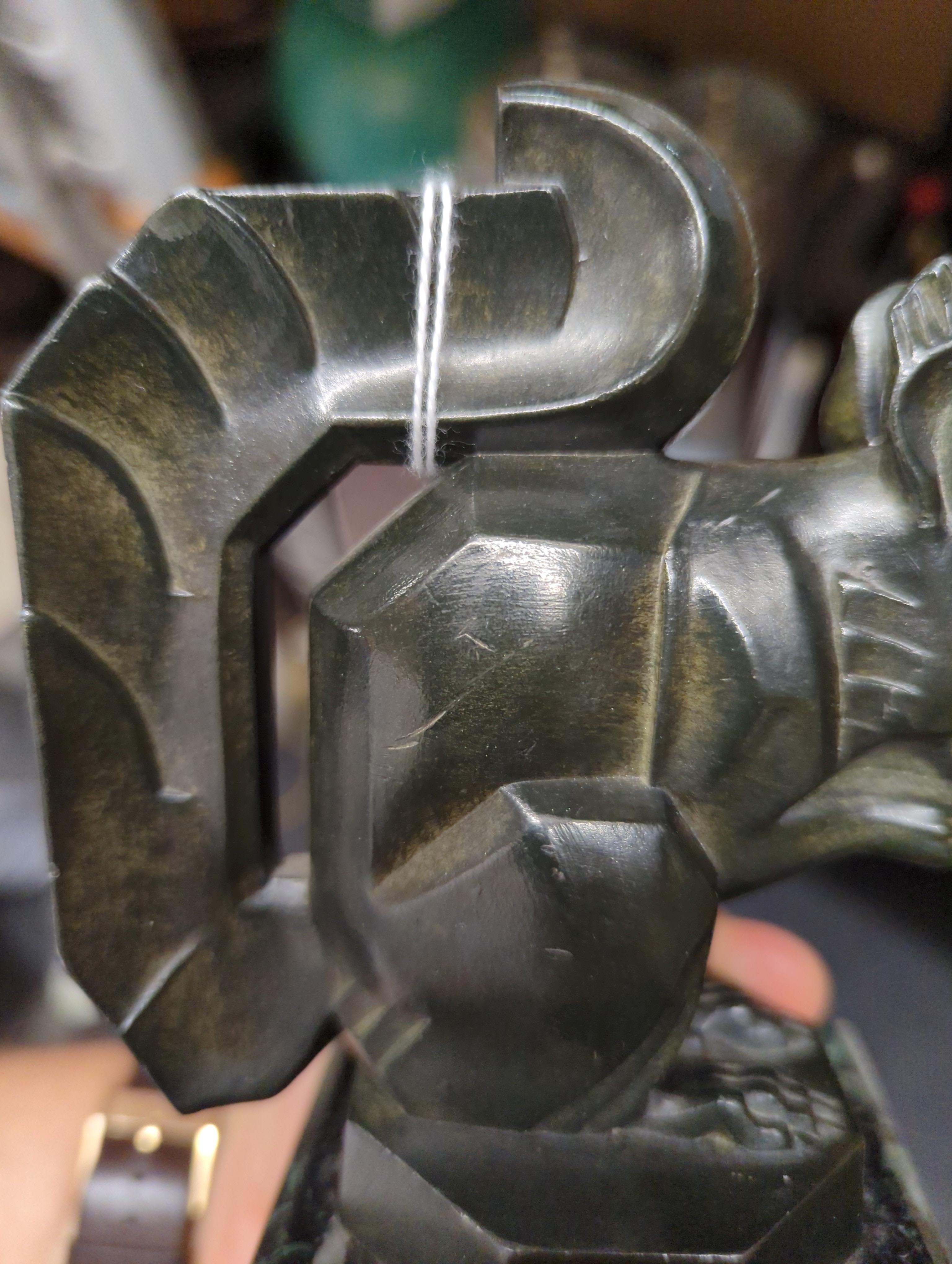 Lot 90 A pair of art metal squirrel bookends,