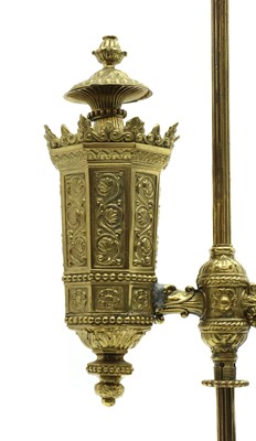 Lot 167 - A pair of Louis Philippe pressed brass Argand student lamps