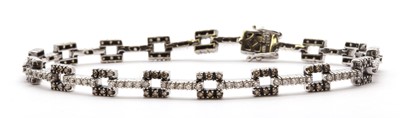 Lot 146 - A white gold diamond bracelet