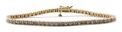 Lot 106 - A gold diamond line bracelet