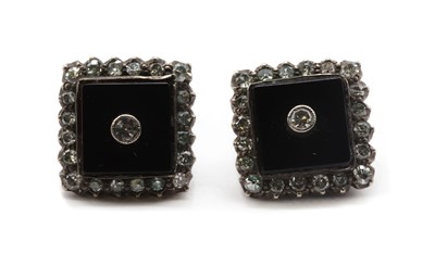 Lot 63 - A pair of silver diamond and onyx earrings