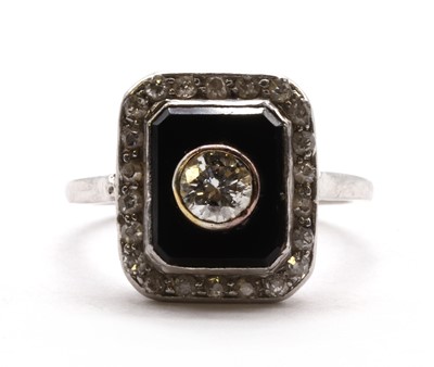 Lot 62 - A diamond and onyx ring