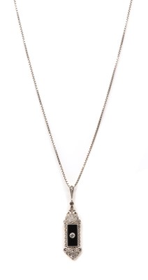 Lot 64 - A diamond and onyx pendant