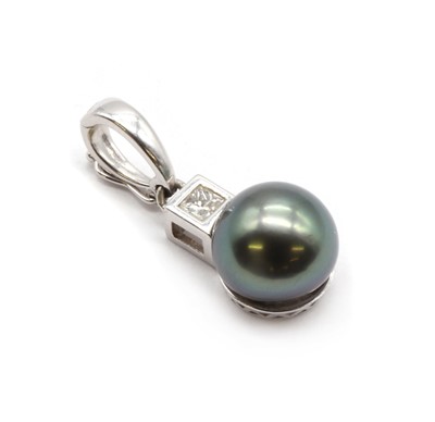 Lot 332 - A white gold cultured Tahitian pearl and diamond pendant