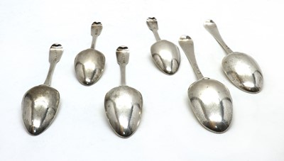 Lot 10 - A set of four George III silver Fiddle pattern dessert spoons