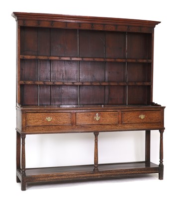 Lot 372 - A George III oak dresser