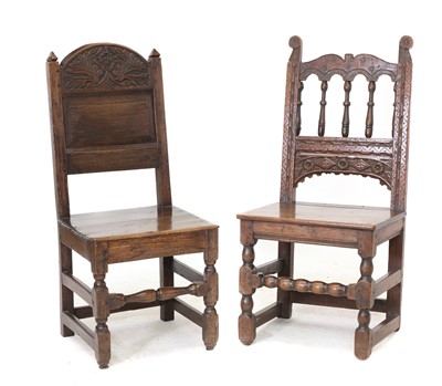 Lot 363 - A carved oak hall side chair