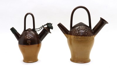 Lot 187 - A pair of Royal Doulton pottery Old Sarum kettles