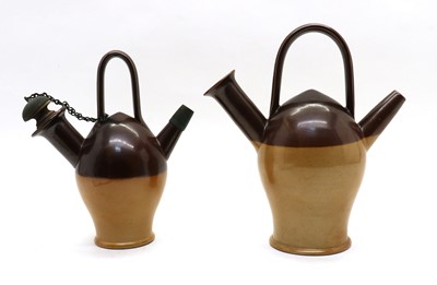 Lot 187 - A pair of Royal Doulton pottery Old Sarum kettles