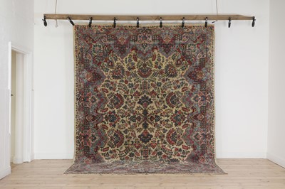 Lot 165 - A Persian wool carpet