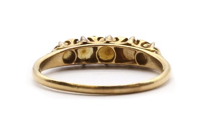 Lot 26 - A gold split pearl and diamond ring