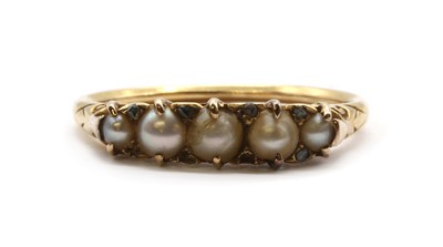 Lot 26 - A gold split pearl and diamond ring