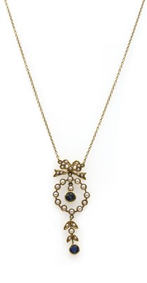 Lot 44 - An Edwardian gold sapphire and split pearl pendant