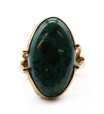 Lot 246 - A gold single stone chrysocolla ring