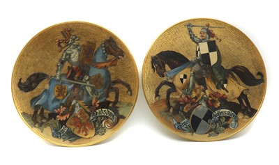 Lot 200 - A pair of German stoneware chargers