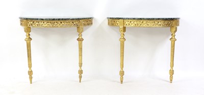 Lot 316 - A pair of neoclassical giltwood console tables