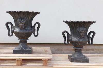 Lot 249 - A pair of classical cast iron garden urns