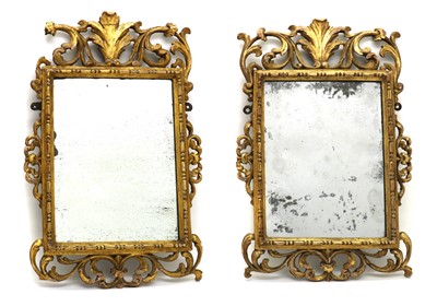 Lot 317 - A pair of carved giltwood framed wall mirrors