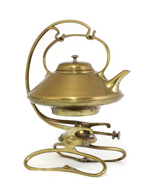 Lot 37 - An Arts and Crafts brass kettle on stand