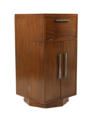Lot 140 - An Art Deco walnut revolving cocktail cabinet
