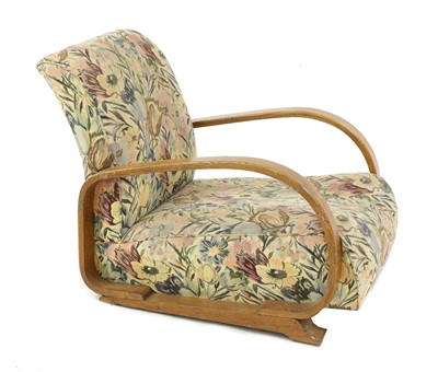 Lot 142 - An Art Deco oak 'Tank' armchair