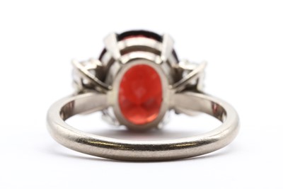 Lot 171 - An 18ct white gold garnet and diamond ring