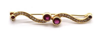 Lot 160 - An 18ct gold ruby and diamond brooch
