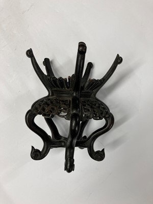 Lot 86 - A collection of Chinese wood stands