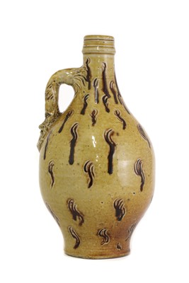 Lot 6 - An R W Martin stoneware 'bellarmine' bottle
